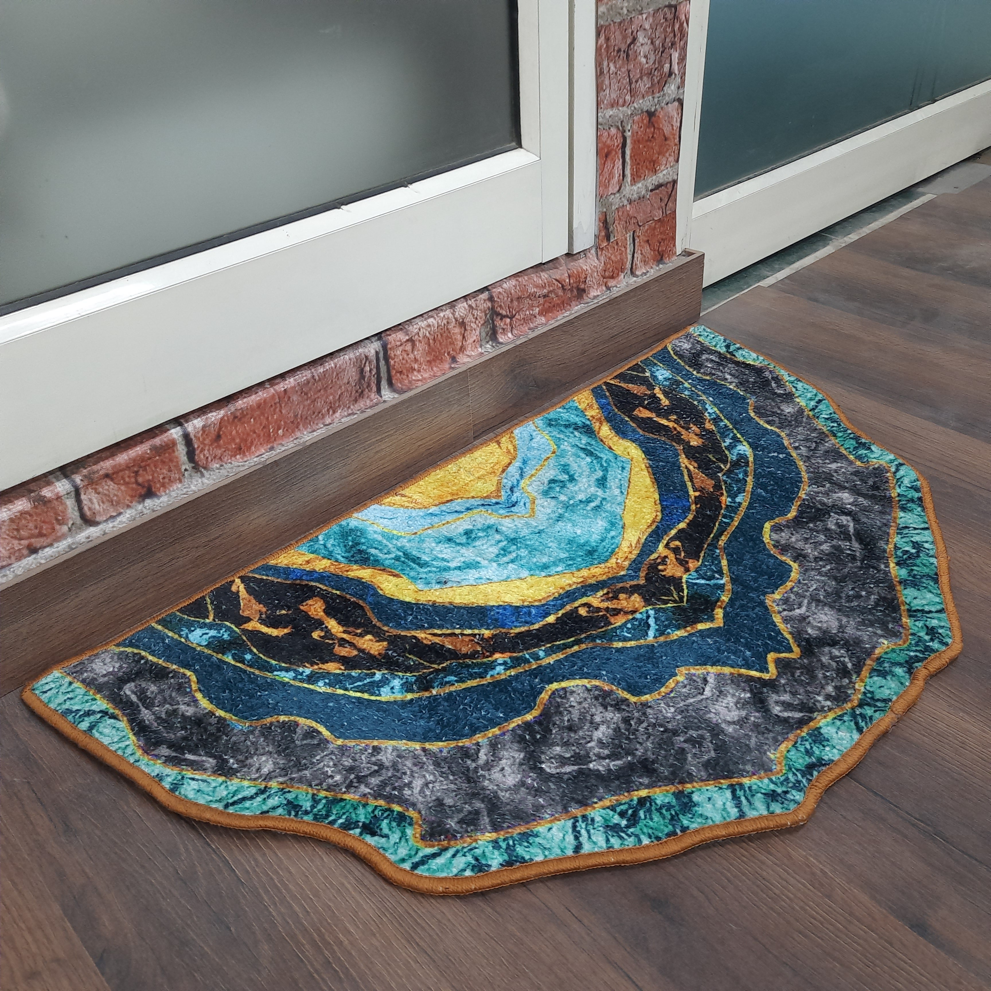 Brightly patterned semi-circle floor mat welcoming family and guests.
