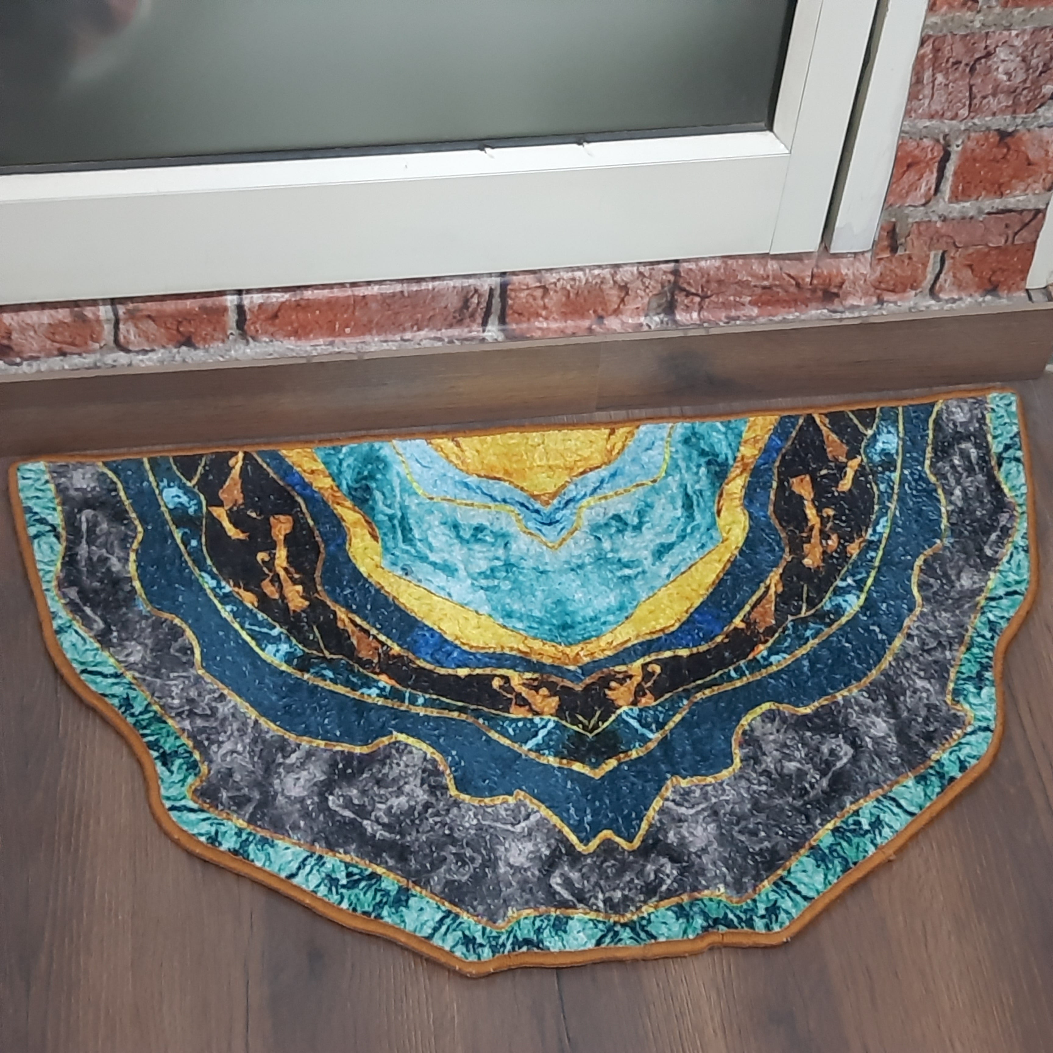 Decorative half-circle mat combining colorful bohemian and geometric styles.