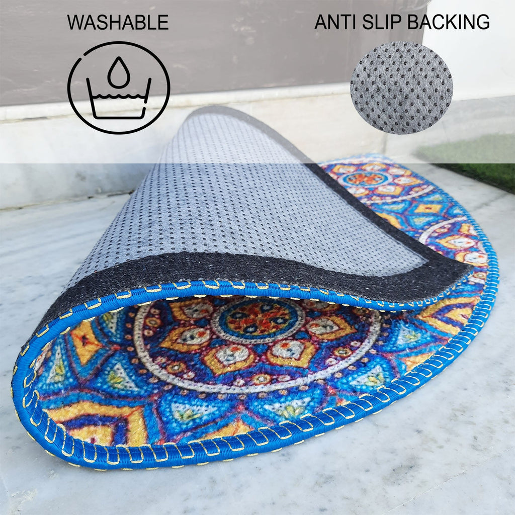 Decorative half-round entry mat with eye-catching colorful design.