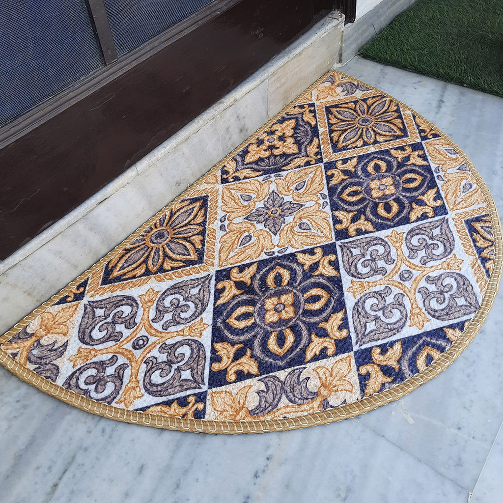 Decorative entrance rug with a vibrant semi-circle geometric design.