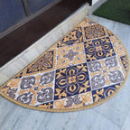 Decorative entrance rug with a vibrant semi-circle geometric design.