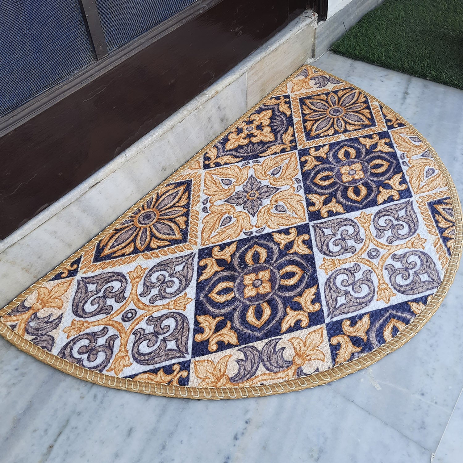 Decorative entrance rug with a vibrant semi-circle geometric design.