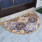 Semi-circular decorative rug with colorful symmetrical artwork.