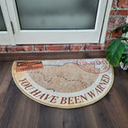 Colorful half-circle floor rug with eye-catching geometric details.