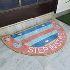 Bright geometric semi-round door mat adding color to a welcoming doorway.