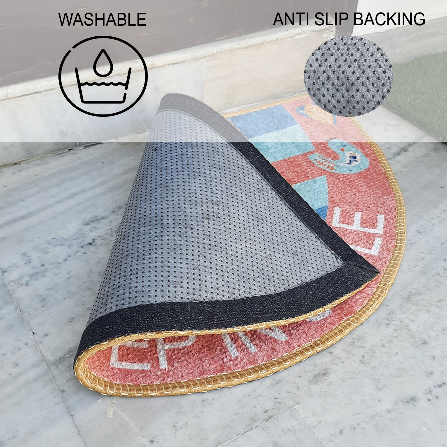 Decorative semi-circle welcome mat placed in front of a natural wooden door.