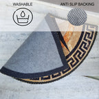 Semi-circular floor mat with multicolor geometric print welcoming guests.
