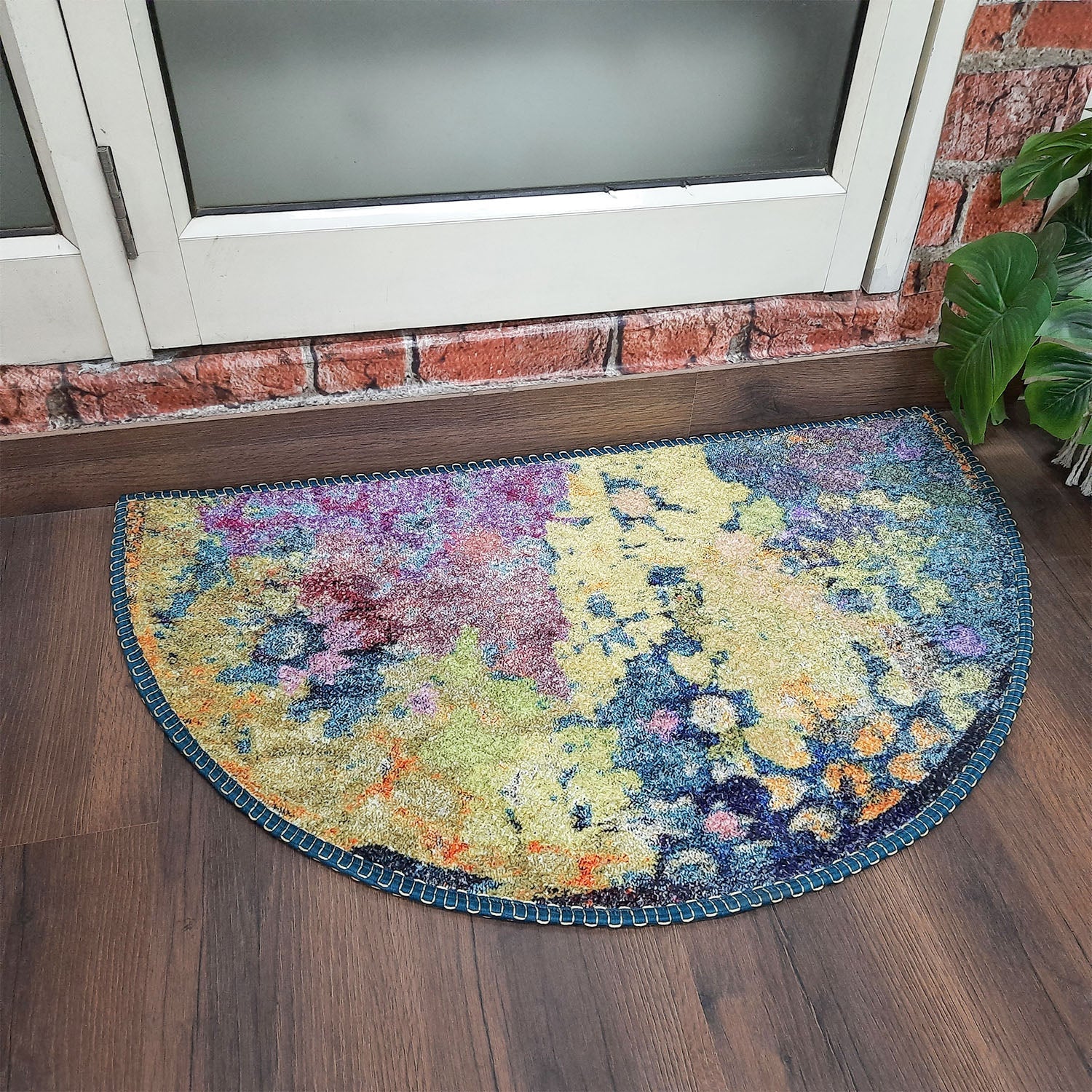 Decorative half-moon rug with vibrant traditional-inspired patterns.