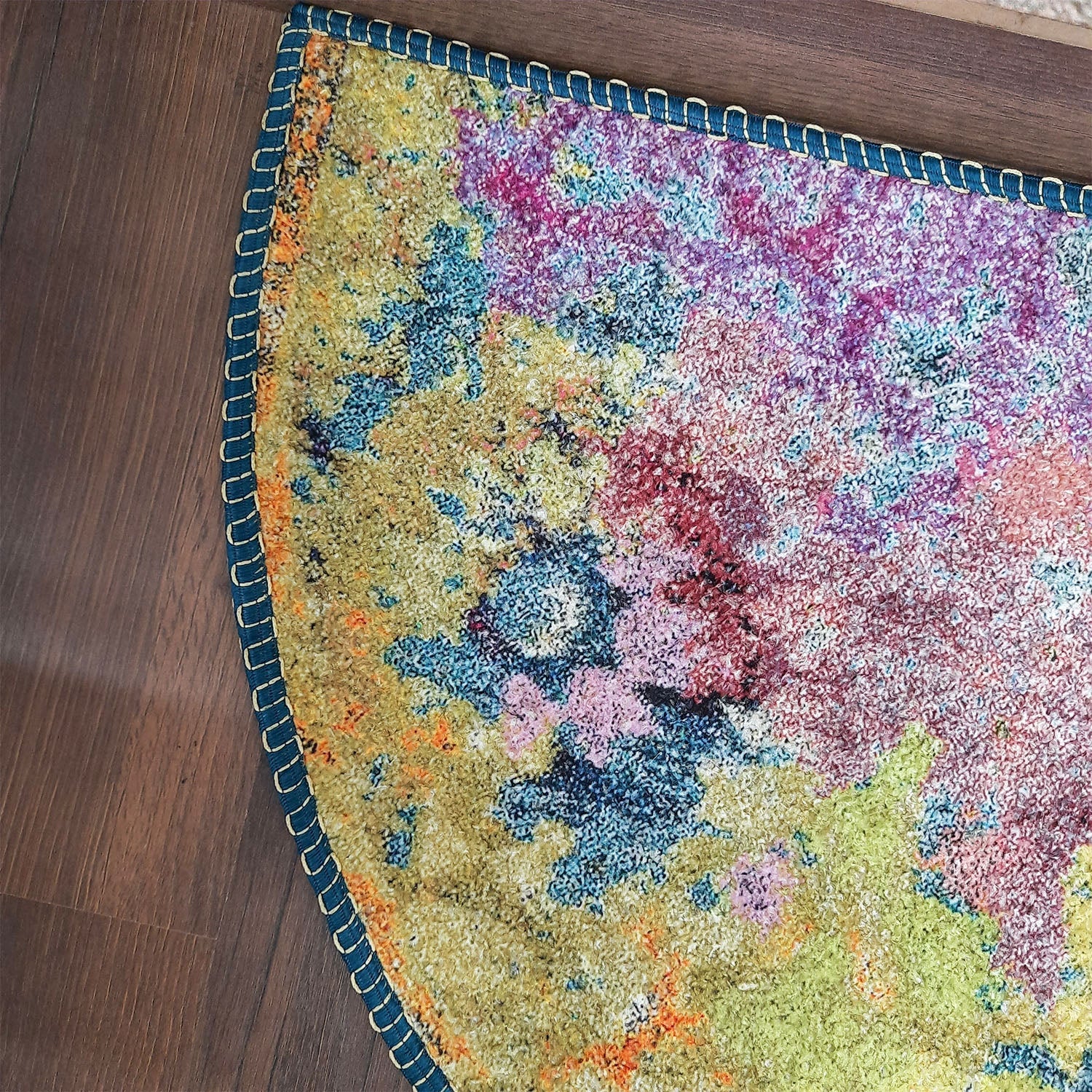 Multicolor geometric entrance mat bringing warmth to the doorway.