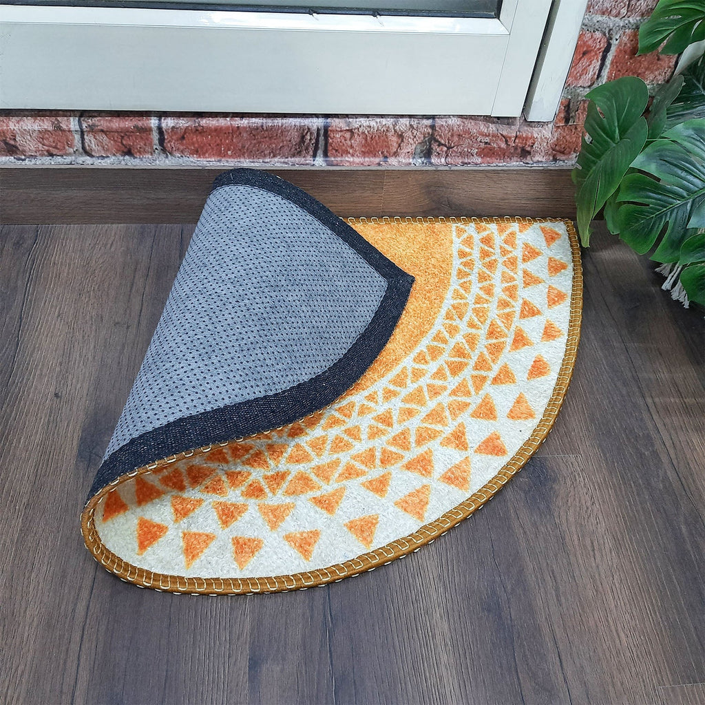 Multicolor geometric entrance rug adding elegance to the doorway.