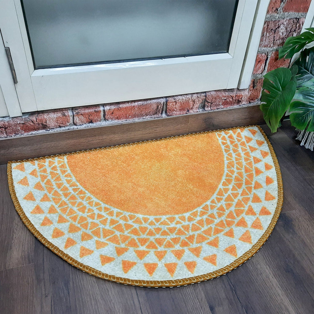 Decorative colorful door mat designed in a classic half-circle shape.