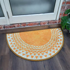 Bright decorative half-circle floor mat on smooth marble flooring.