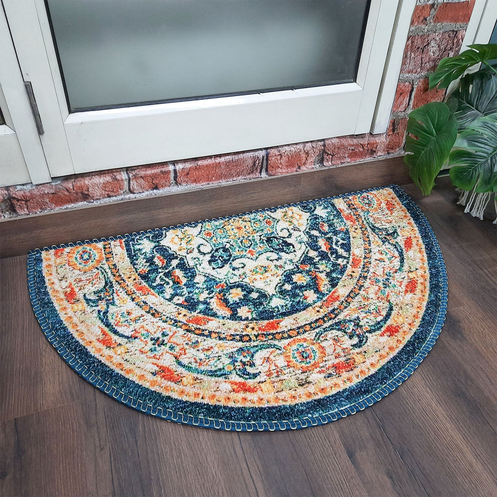 Elegant half-circle entrance mat with colorful geometric accents.