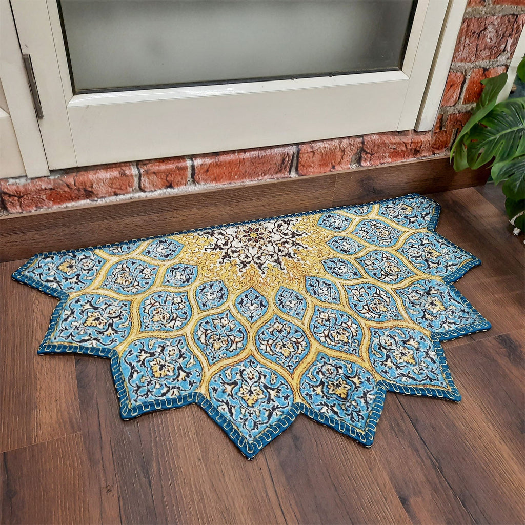 Decorative bohemian entrance mat with vibrant geometric patterns.