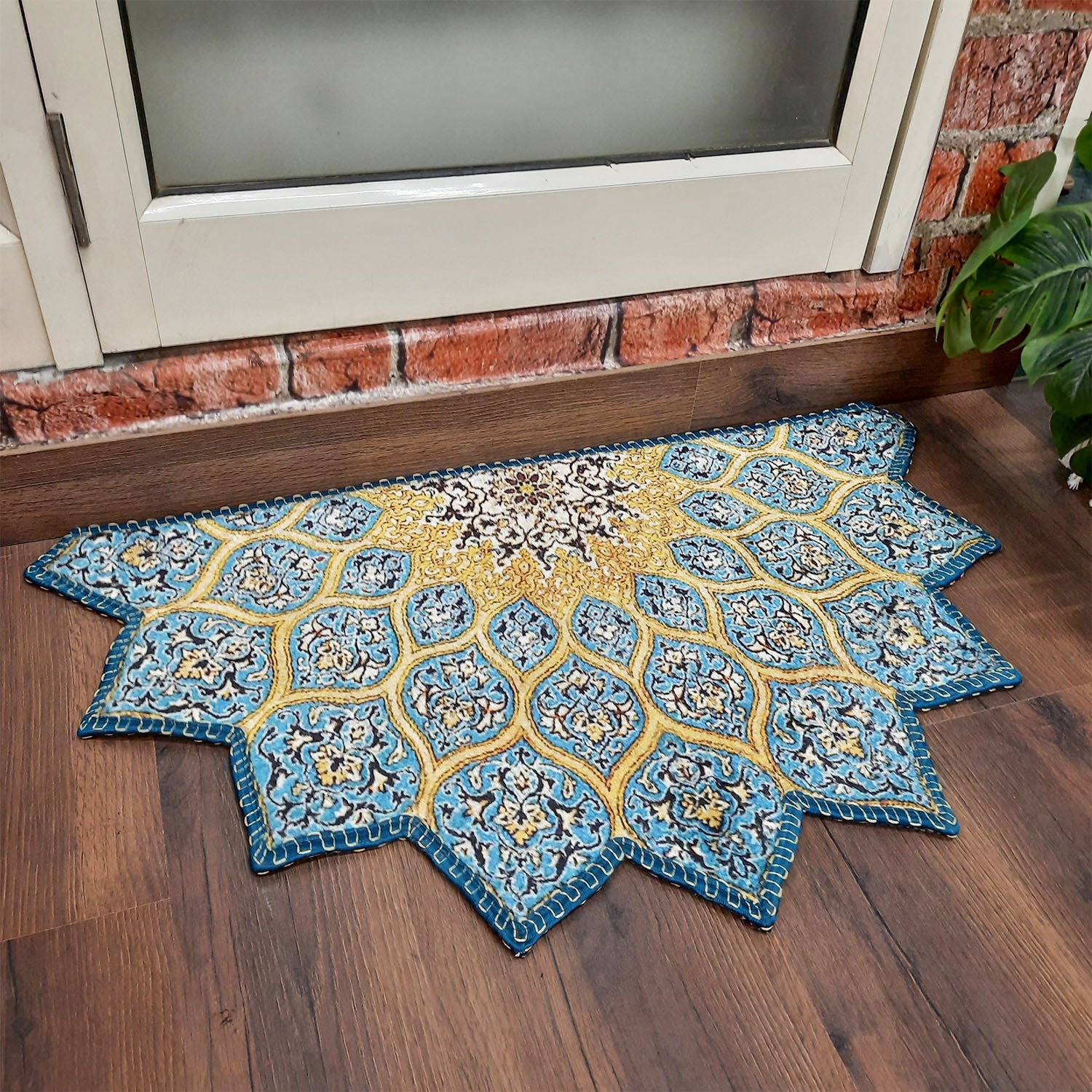 Decorative bohemian entrance mat with vibrant geometric patterns.