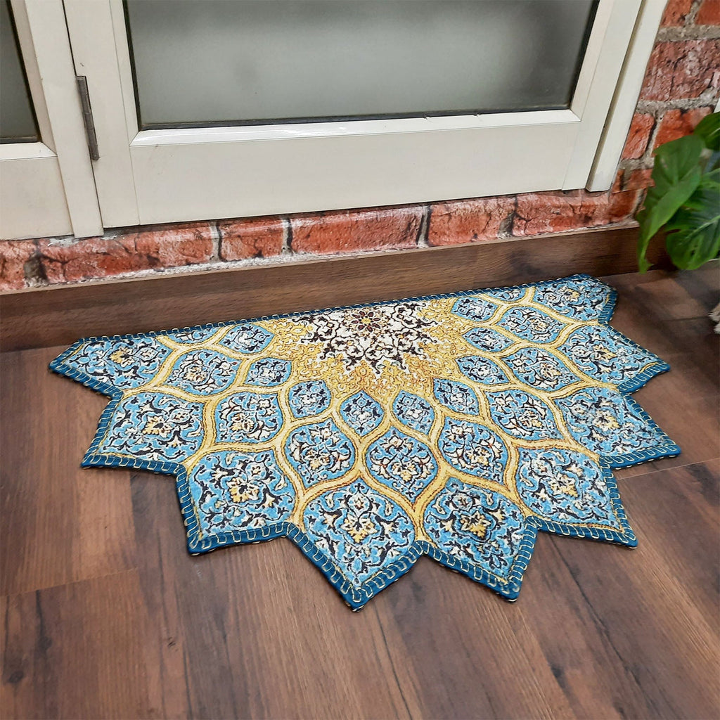 Geometric patterned semi-circle rug placed at a welcoming doorway.