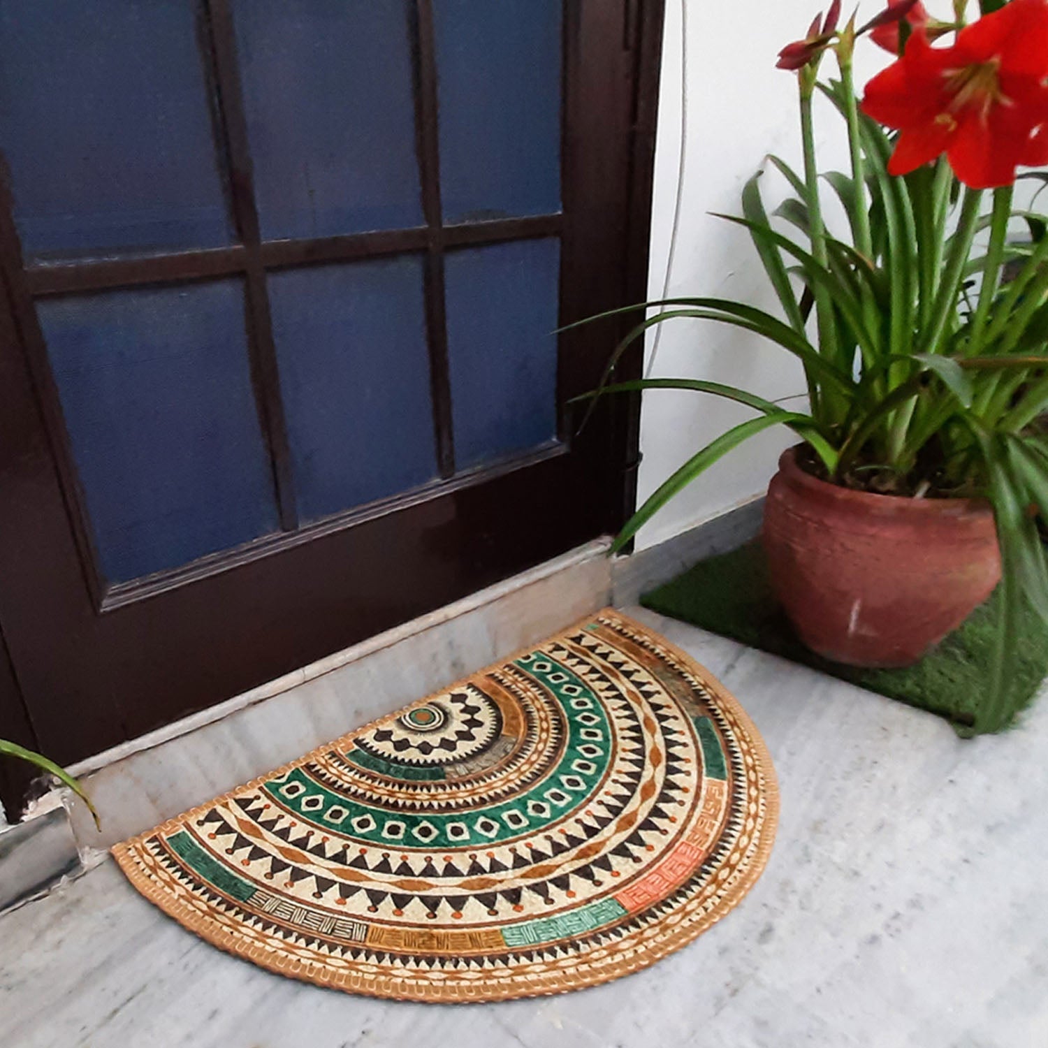 Decorative semi-circle rug featuring colorful mandala-inspired patterns.
