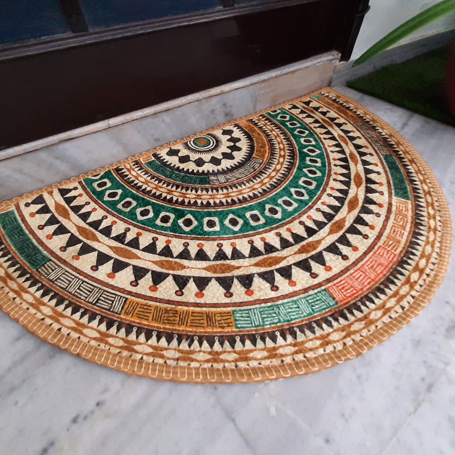 Stylish half-round entrance mat on luxurious marble flooring.